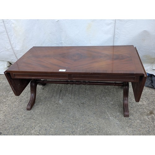 674 - A mahogany vernier drop leaf coffee table