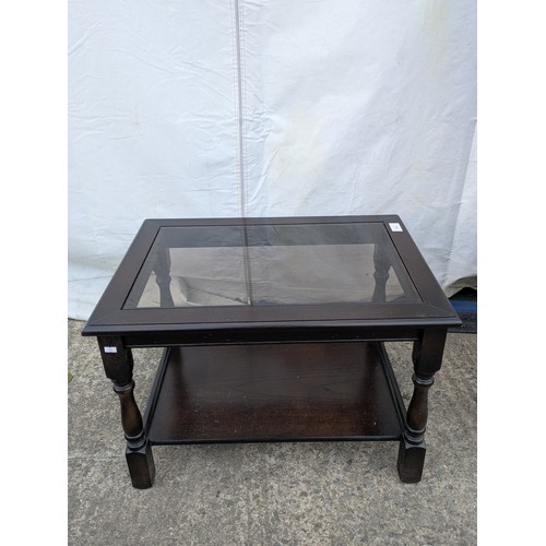 676 - A pine glass top coffee table