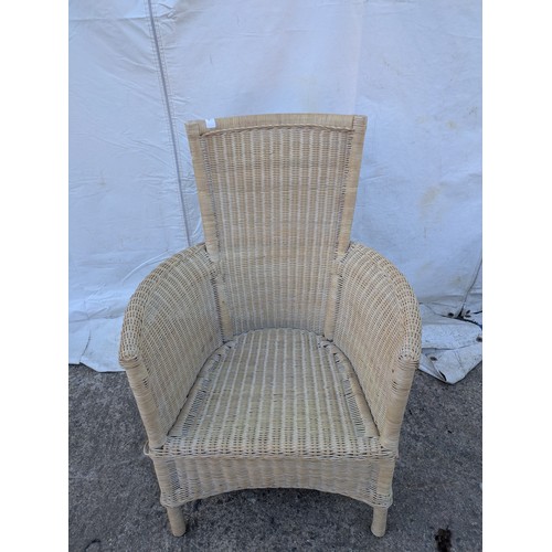 679 - A wicker outdoor/conservatory chair