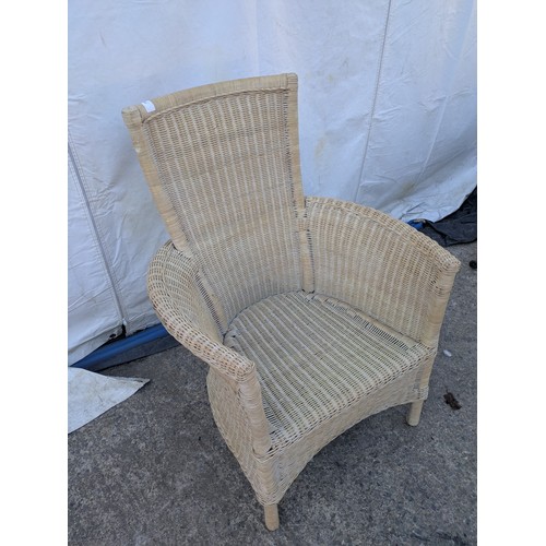 679 - A wicker outdoor/conservatory chair