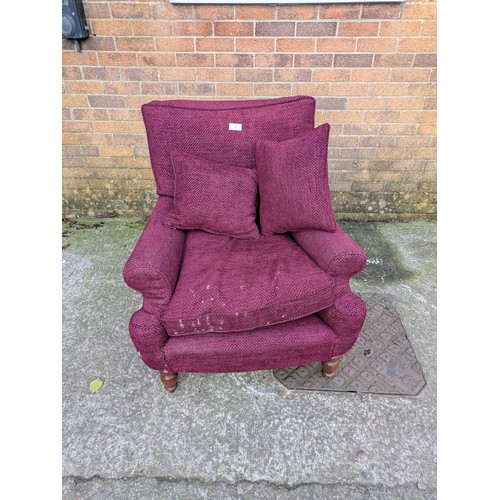 681 - A purple fabric upholstered armchair