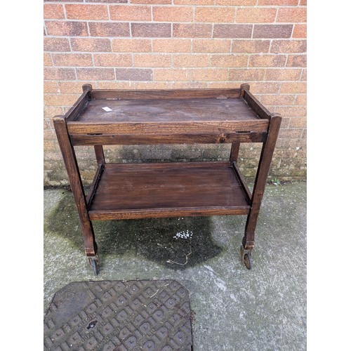 684 - A Vintage pine service trolley with removable top tray