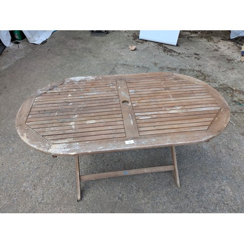 126 - A pine garden table