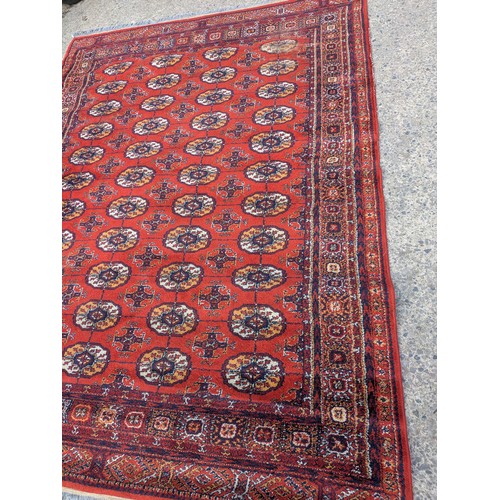 432 - A large wool area rug approx 172cmx230cm