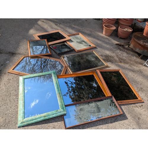 431 - A large selection of various wall hanging mirrors