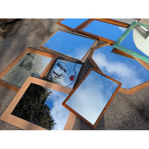 431 - A large selection of various wall hanging mirrors