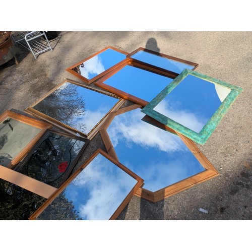 431 - A large selection of various wall hanging mirrors