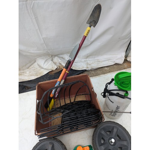 118 - A large selection of various outdoor tools and supplies