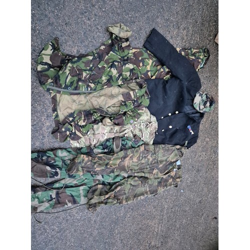 2146 - A Selection of military clothing including camo coats, trousers and a dress jacket