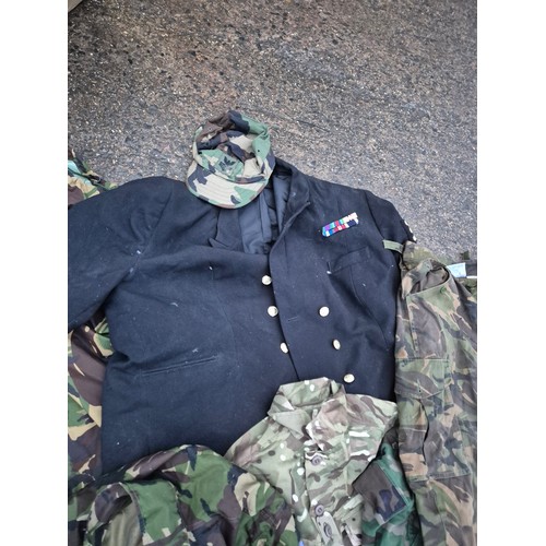 2146 - A Selection of military clothing including camo coats, trousers and a dress jacket