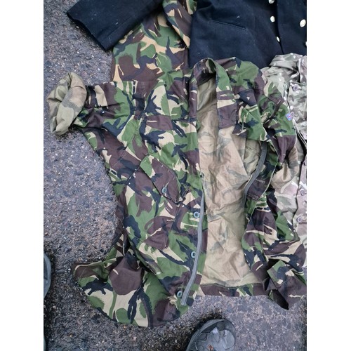 2146 - A Selection of military clothing including camo coats, trousers and a dress jacket