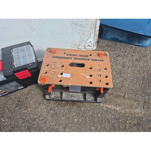 A selection of tools boxes including a black and Decker workmate ...
