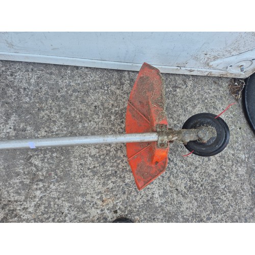 209 - A Tanaka TBC-230 petrol strimmer