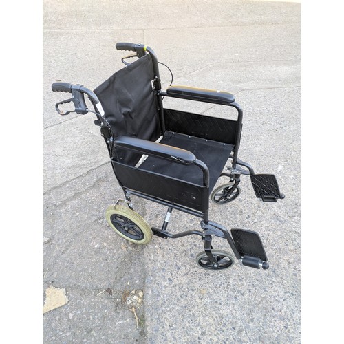 210 - A collapsible wheelchair