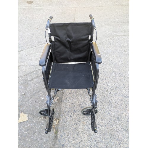 210 - A collapsible wheelchair