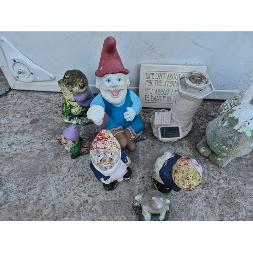 212 - A selection of garden ornaments