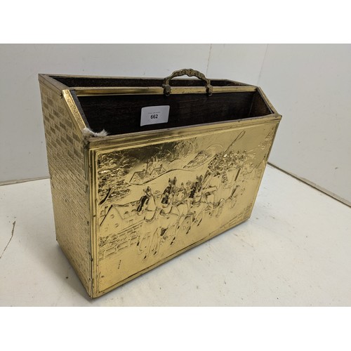 662 - A vintage brass newspaper rack with a traditional scene