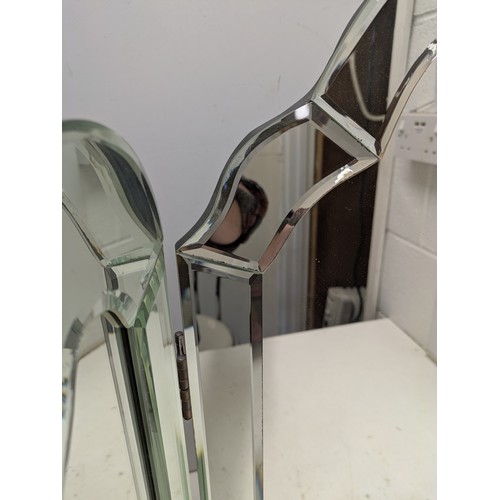 689 - A three piece Bevelled edge mirror