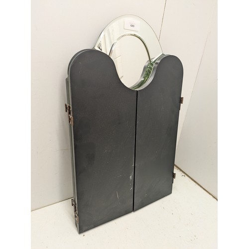 689 - A three piece Bevelled edge mirror