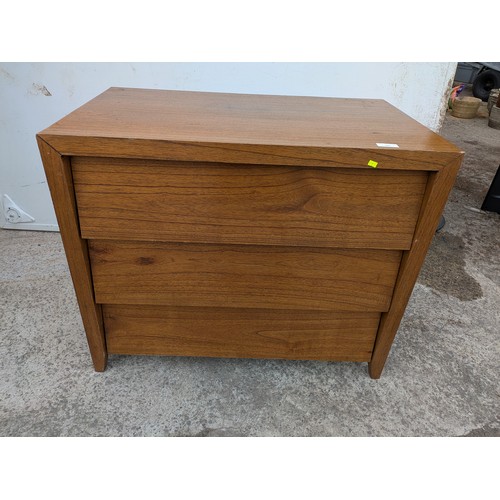 693 - A mid century 3 drawer chest of drawers