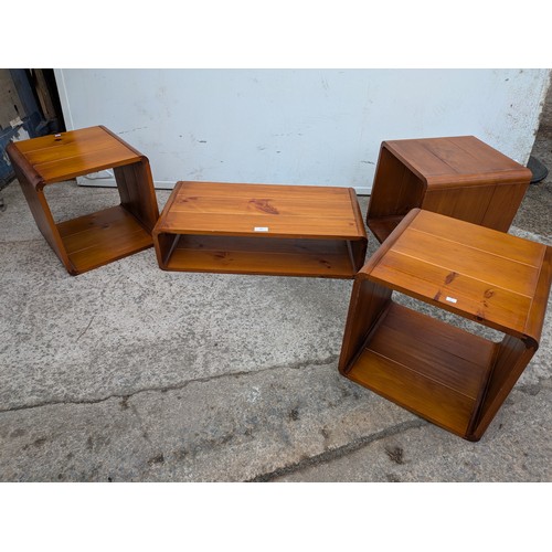 695 - A quantity of retro pine side tables
