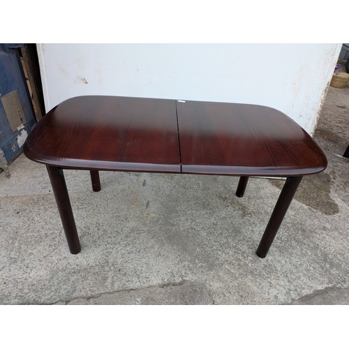 696 - A mahogany extending dining table