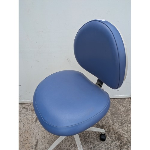 673 - A fully adjustable blue and white office chair