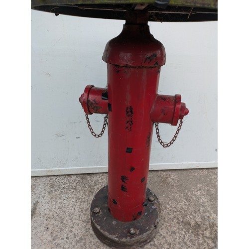 657 - A interesting table in the style of a American fire hydrant