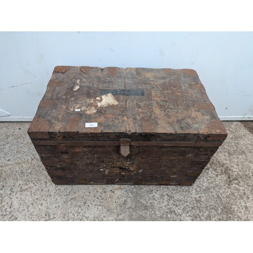 669 - An early 20th century steamer trunk with metal reinforcements