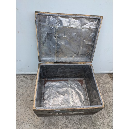 670 - An early 20th century steamer trunk