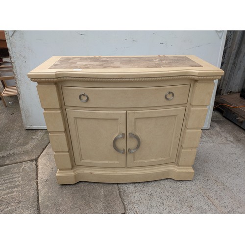 660 - A modern oak storage unit with a marble chess board style top, with drawer and cupboard space