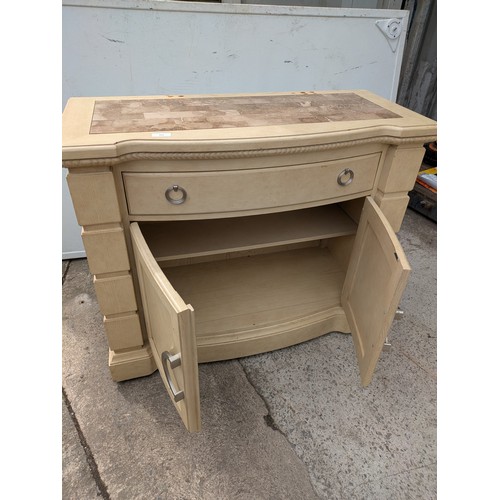 660 - A modern oak storage unit with a marble chess board style top, with drawer and cupboard space
