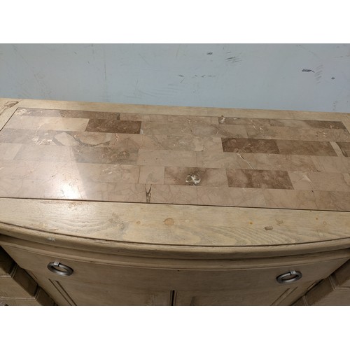 659 - A modern oak storage unit with a marble chess board style top, with drawer and cupboard space