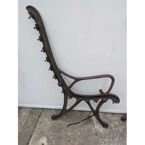 293 - A pair of cast iron bench ends