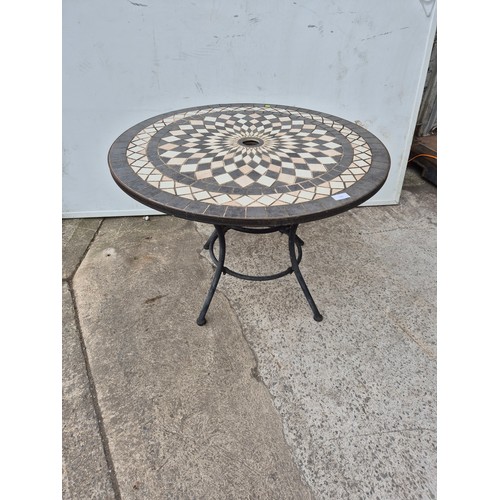 336 - A mosaic topped outdoor table