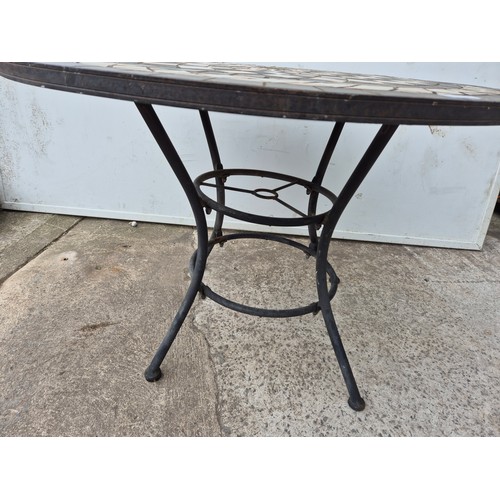 336 - A mosaic topped outdoor table