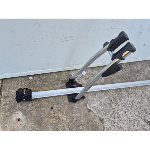 313 - A universal roof mounted bicycle carrier with key