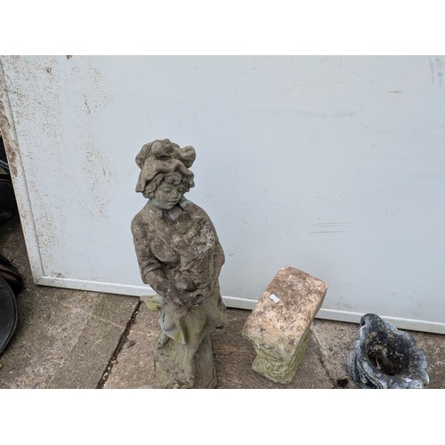 374 - A large selection of concrete garden figures