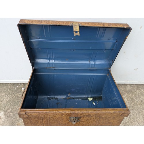 399 - A vintage metal storage trunk