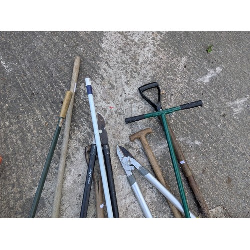 353 - A large selection of garden tools and equipment