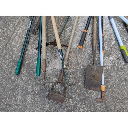 353 - A large selection of garden tools and equipment