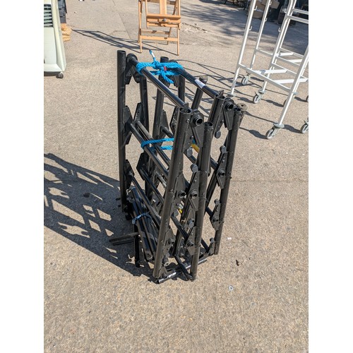 126 - A heavy duty collapsible ladder