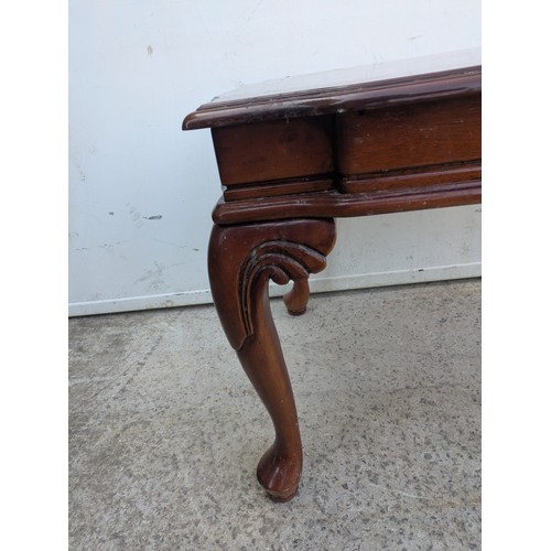 414 - A ornate carved coffee table