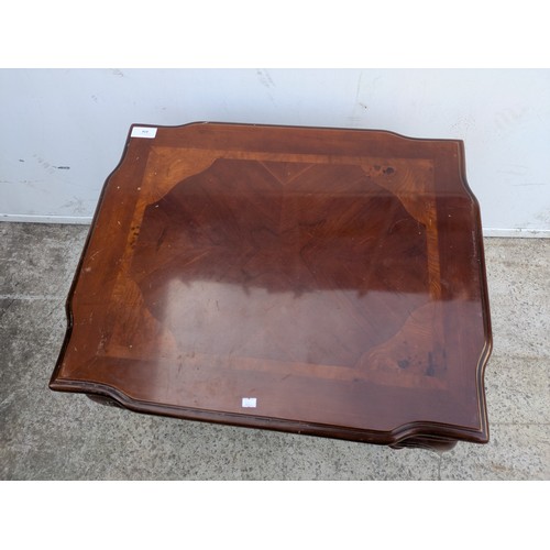 414 - A ornate carved coffee table