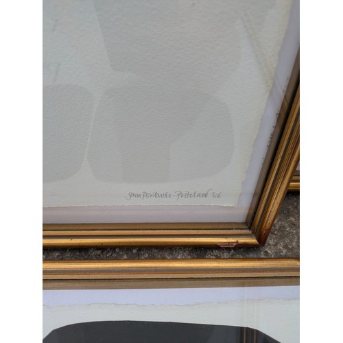 454 - A trio of papyrus framed inscriptions - signed by John Rowlands-Pritchard