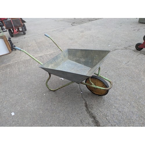 8 - A vintage galvanized wheelbarrow