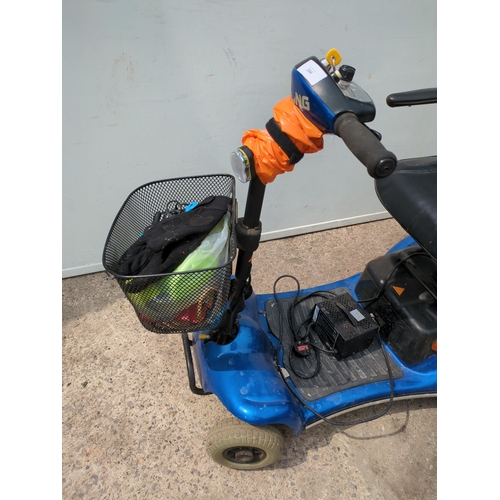 244 - A Sterling mobility scooter with keys and charger