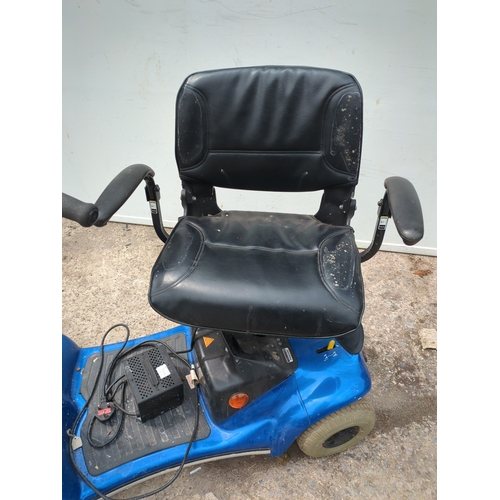 244 - A Sterling mobility scooter with keys and charger