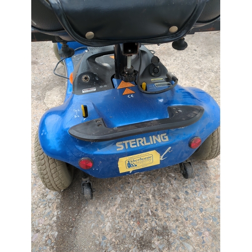 244 - A Sterling mobility scooter with keys and charger