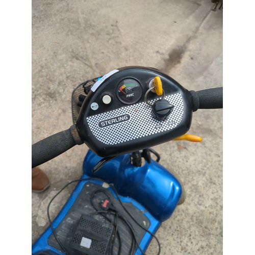 244 - A Sterling mobility scooter with keys and charger